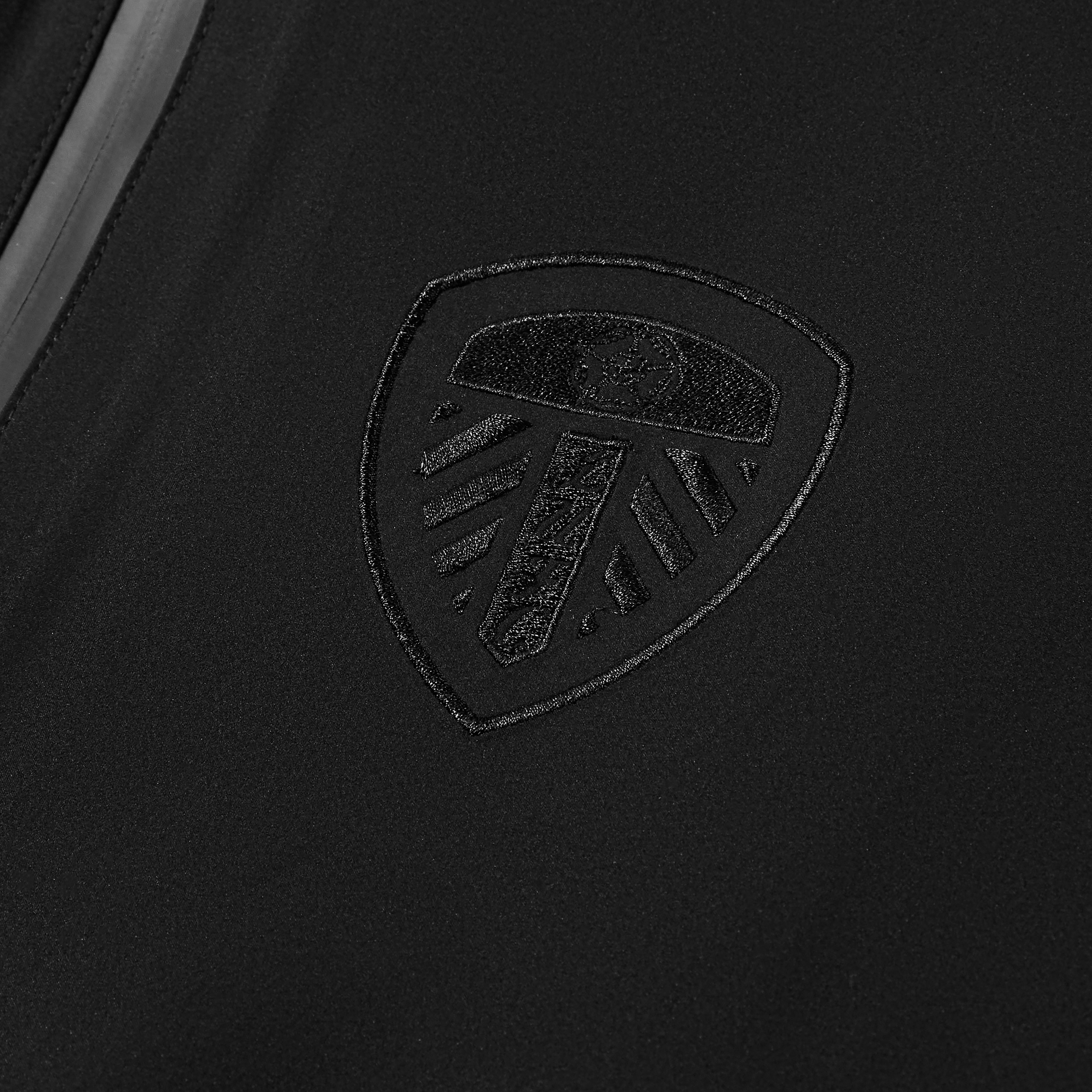AOF Leeds United Shell Jacket | Black Coat | Art of Football